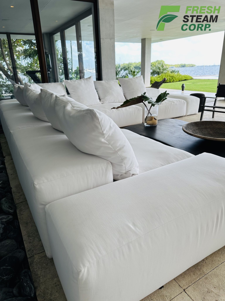 Professional white sofa steam cleaning service in Miami by Fresh Steam Corp